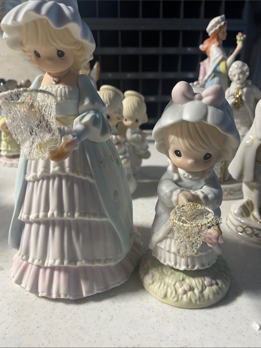 Precious Moments Pastel Blue and Pink Porcelain Girl Figurine Pair